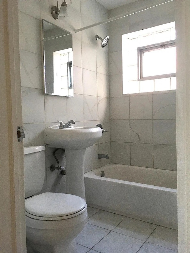 142 E Grove St, Lombard, IL 60148 - bathroom with toilet, tile patterned flooring, bathing tub / shower combination, and tile walls