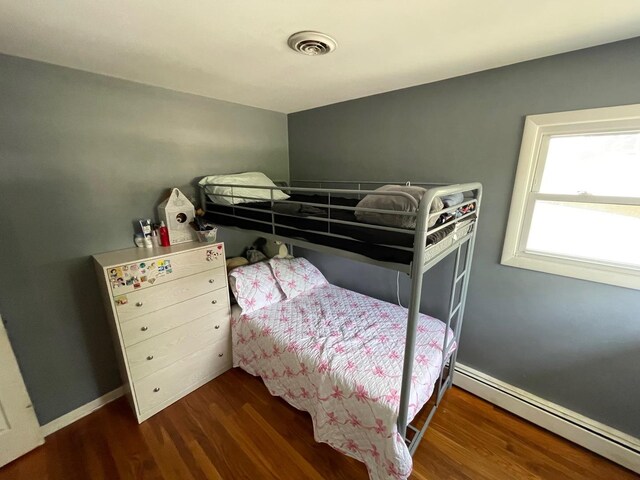 165 Kathleen Dr, Elgin, IL 60123 - bedroom featuring a baseboard radiator, wood finished floors, and baseboards