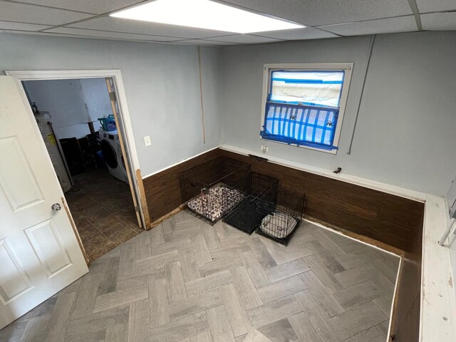 165 Kathleen Dr, Elgin, IL 60123 - empty room featuring washer / clothes dryer, a paneled ceiling, and baseboards
