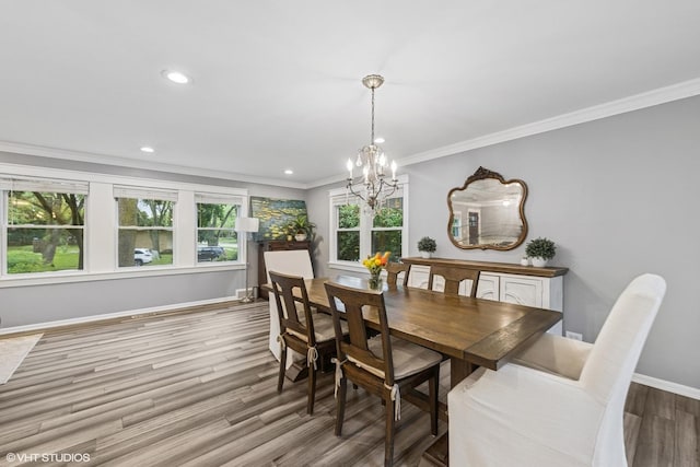 805 S Main St, Wheaton, IL 60189 - dining room with wood finished floors, a chandelier, ornamental molding, baseboards, and recessed lighting