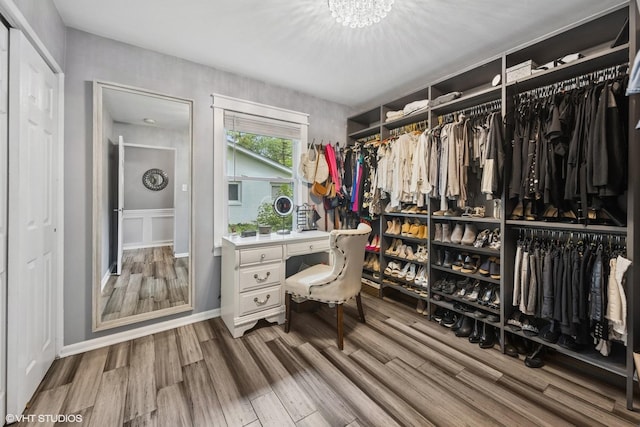 805 S Main St, Wheaton, IL 60189 - walk in closet with wood finished floors and a chandelier