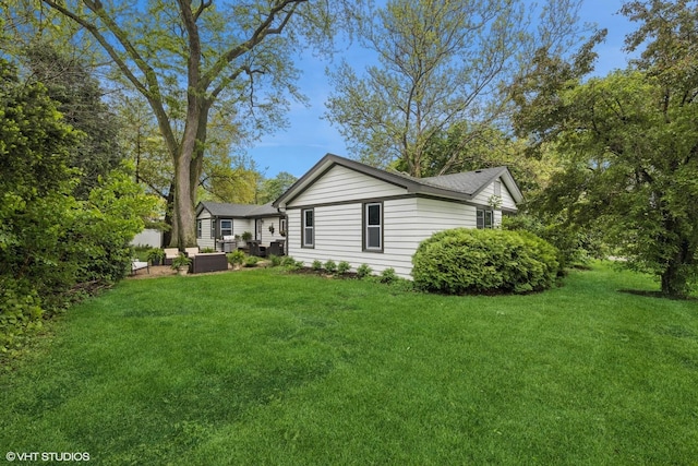 805 S Main St, Wheaton, IL 60189 - view of side of property with a yard, outdoor lounge area, and cooling unit
