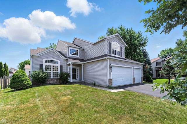 16517 Newbury Ct, Crest Hill, IL 60403 - traditional-style house featuring an attached garage, asphalt driveway, and brick siding