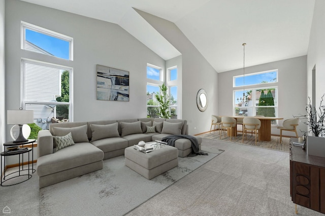 16517 Newbury Ct, Crest Hill, IL 60403 - living area featuring high vaulted ceiling, carpet floors, and a chandelier