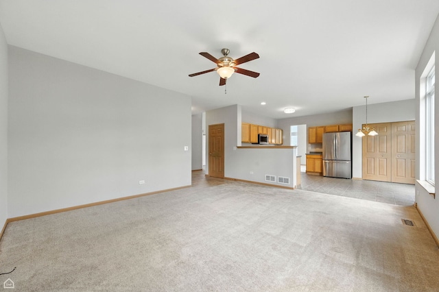 16517 Newbury Ct, Crest Hill, IL 60403 - unfurnished living room with a ceiling fan and light carpet