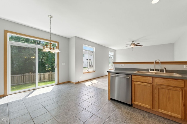 16517 Newbury Ct, Crest Hill, IL 60403 - kitchen with stainless steel dishwasher, dark countertops, ceiling fan, hanging light fixtures, and light tile patterned flooring