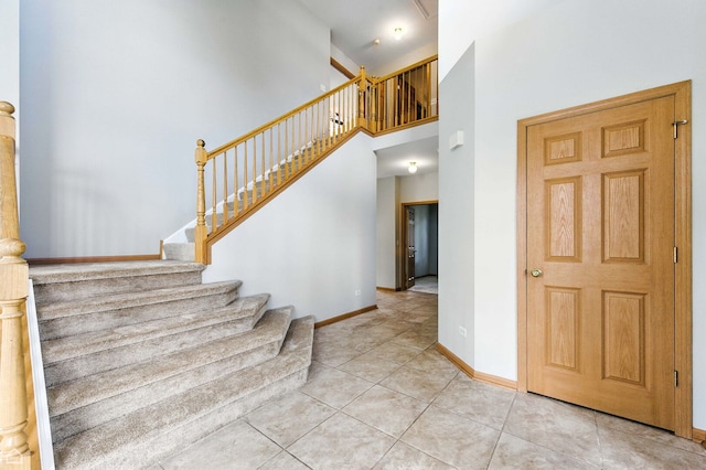 16517 Newbury Ct, Crest Hill, IL 60403 - staircase featuring a towering ceiling and tile patterned flooring