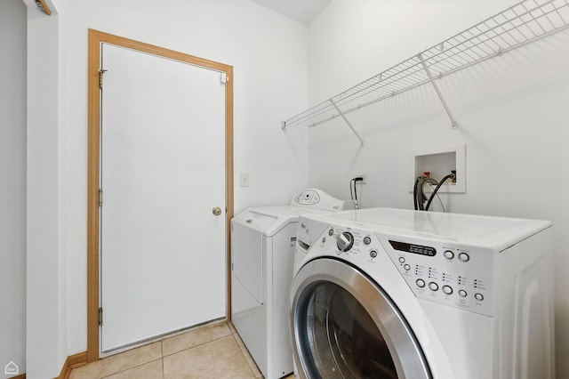 16517 Newbury Ct, Crest Hill, IL 60403 - laundry room with separate washer and dryer and light tile patterned floors