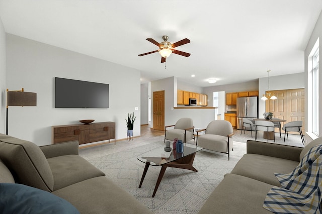 16517 Newbury Ct, Crest Hill, IL 60403 - living room featuring a ceiling fan, plenty of natural light, and light carpet