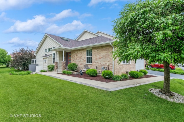 6016 W Kennedy Ct, Monee, IL 60449 - view of front facade with an attached garage, a front yard, brick siding, and roof with shingles