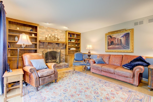 13711 83rd Ave, Orland Park, IL 60462 - living area with built in shelves, wood finished floors, and a fireplace