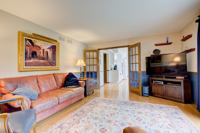 13711 83rd Ave, Orland Park, IL 60462 - living area with wood finished floors and french doors
