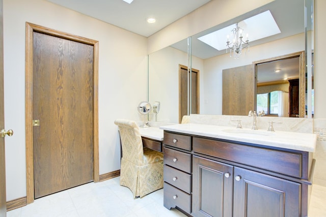 13711 83rd Ave, Orland Park, IL 60462 - bathroom featuring a skylight, a chandelier, and vanity