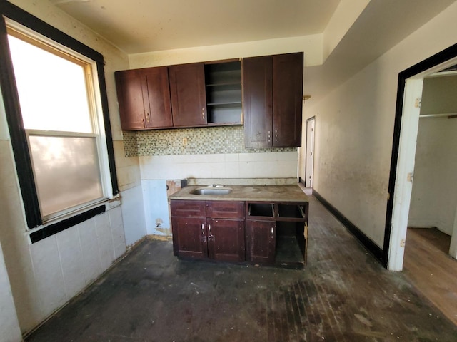 5732 S Sangamon St, Chicago, IL 60621 - kitchen with open shelves, backsplash, and a sink