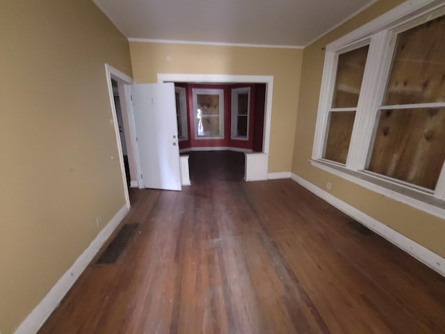 5732 S Sangamon St, Chicago, IL 60621 - empty room with baseboards, wood finished floors, and ornamental molding