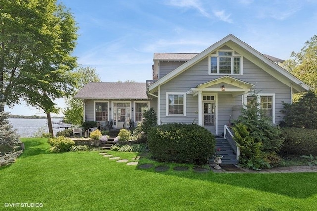 4014 Pitzen Rd, Johnsburg, IL 60051 - view of front of property featuring a front lawn and a water view