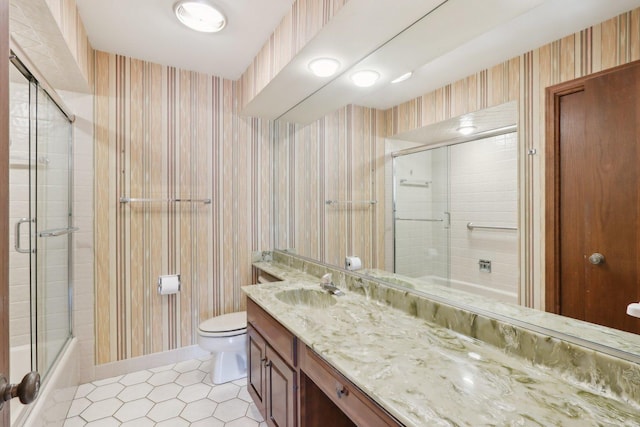 6400 N Cicero Ave Unit 404, Lincolnwood, IL 60712 - bathroom featuring toilet, wallpapered walls, vanity, shower / bath combination with glass door, and tile patterned floors