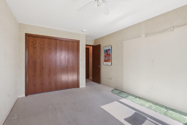 6400 N Cicero Ave Unit 404, Lincolnwood, IL 60712 - unfurnished bedroom featuring light carpet, a closet, and a ceiling fan