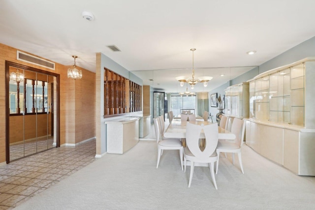 6400 N Cicero Ave Unit 404, Lincolnwood, IL 60712 - dining space featuring a chandelier and baseboards