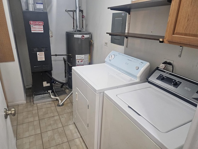 1182 Middlebury Ln Unit D1, Wheeling, IL 60090 - laundry area with washer and clothes dryer, electric panel, gas water heater, and cabinet space