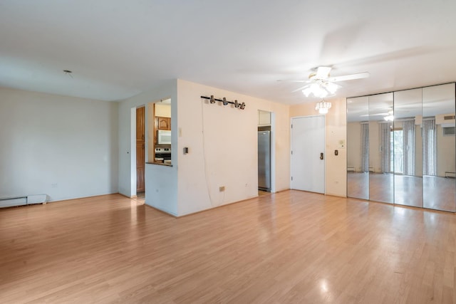 1210 N Dale Ave Unit 2I, Arlington Heights, IL 60004 - unfurnished living room featuring ceiling fan and light wood-style flooring