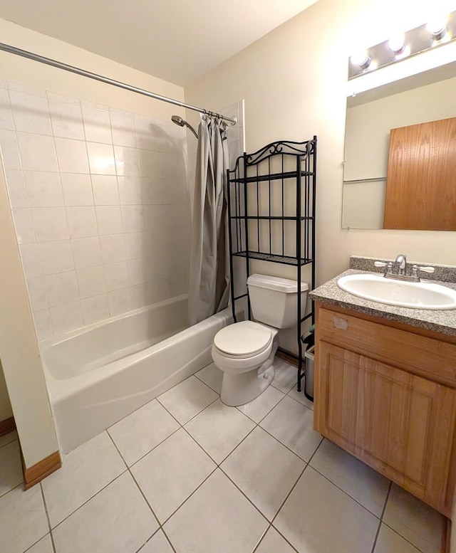 3383 S Archer Ave, Chicago, IL 60608 - full bath with shower / bath combo, tile patterned flooring, toilet, and vanity