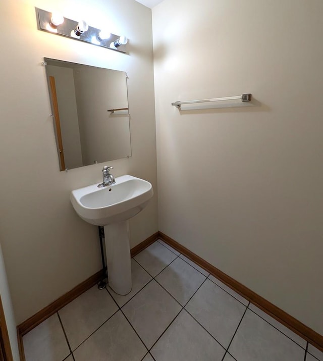 3383 S Archer Ave, Chicago, IL 60608 - bathroom with tile patterned floors and baseboards