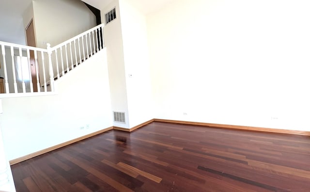 3383 S Archer Ave, Chicago, IL 60608 - spare room featuring wood finished floors and baseboards