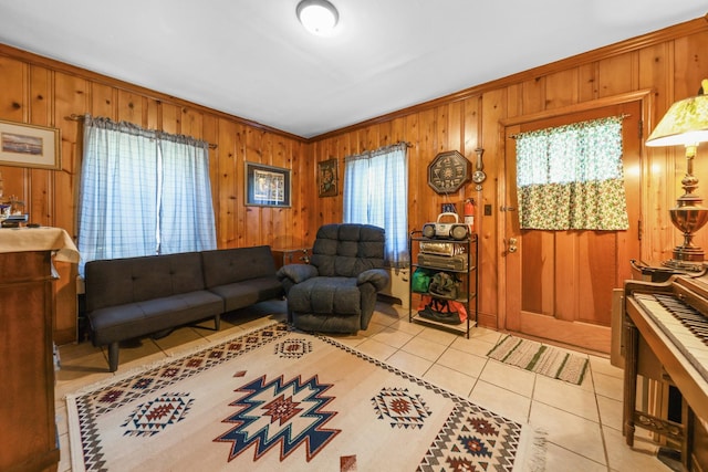 605 E St, Mazon, IL 60444 - living area featuring light tile patterned flooring, wood walls, and ornamental molding