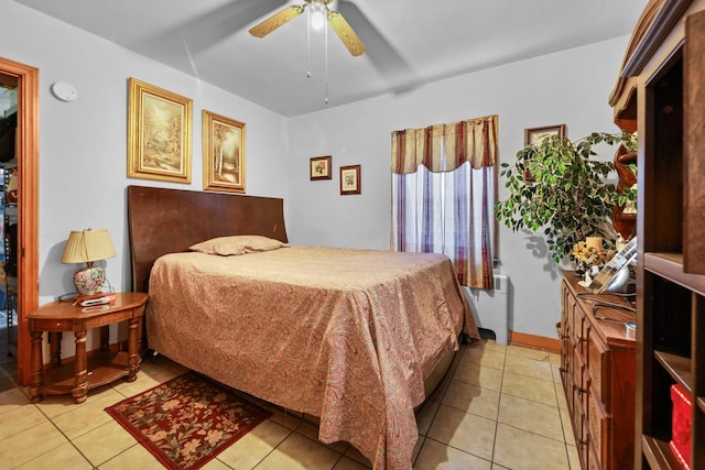 605 E St, Mazon, IL 60444 - bedroom with radiator, light tile patterned floors, and a ceiling fan