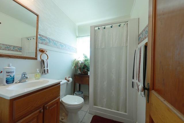 605 E St, Mazon, IL 60444 - bathroom featuring toilet, vanity, tile patterned flooring, and a shower with shower curtain