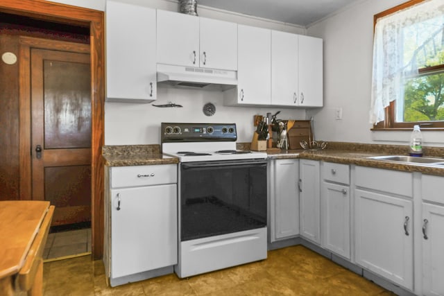 605 E St, Mazon, IL 60444 - kitchen featuring under cabinet range hood, electric stove, dark countertops, and white cabinets