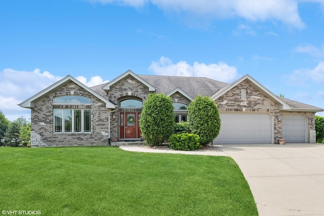 9265 Maura Ct, Frankfort, IL 60423 - french country style house featuring brick siding, a front lawn, a garage, concrete driveway, and a shingled roof