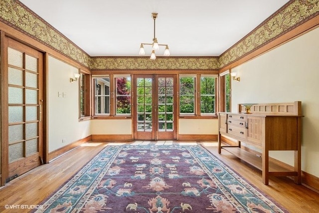 2400 Park Pl, Evanston, IL 60201 - doorway to outside with french doors, wood finished floors, and baseboards
