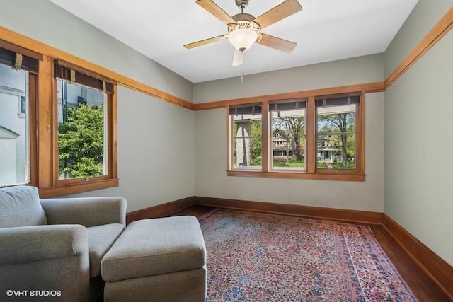 2400 Park Pl, Evanston, IL 60201 - living area with wood finished floors, baseboards, and ceiling fan