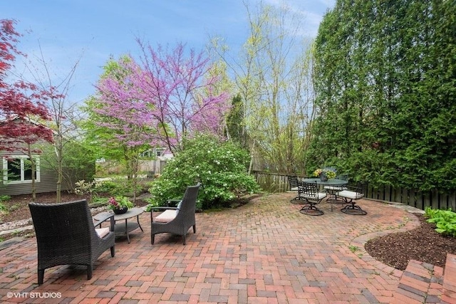 2400 Park Pl, Evanston, IL 60201 - fenced backyard featuring a patio area and outdoor dining area