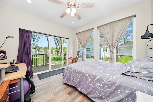 2215 N Woodlawn Park Ave, Mchenry, IL 60051 - bedroom featuring access to exterior, wood finished floors, multiple windows, recessed lighting, and a ceiling fan
