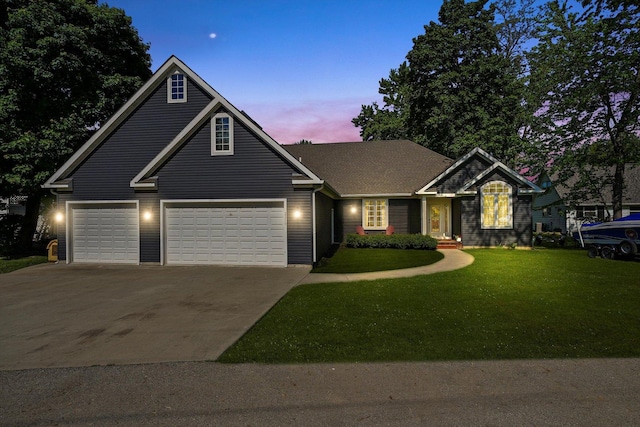2215 N Woodlawn Park Ave, Mchenry, IL 60051 - traditional-style home featuring concrete driveway, a lawn, and an attached garage