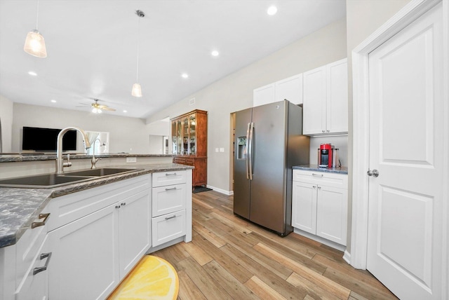 2215 N Woodlawn Park Ave, Mchenry, IL 60051 - kitchen featuring stainless steel fridge with ice dispenser, a sink, light wood finished floors, white cabinetry, and recessed lighting