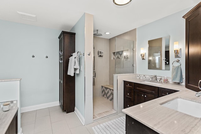 1101 Juniper Ter, Glenview, IL 60025 - full bathroom with a shower stall, vanity, tile patterned floors, and baseboards