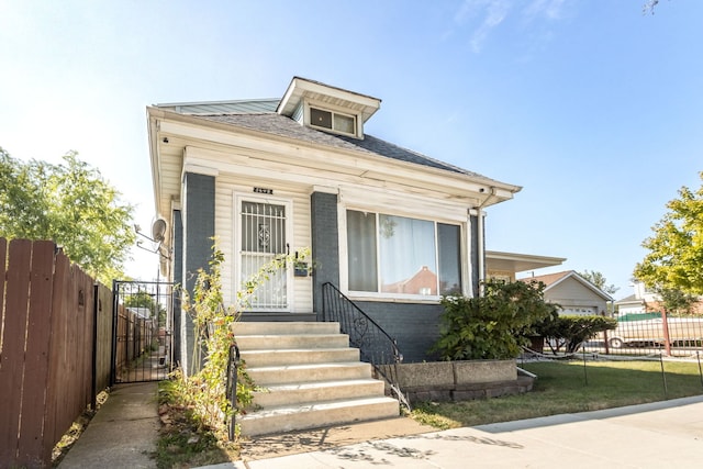 5648 S California Ave, Chicago, IL 60629 - view of front facade with a gate