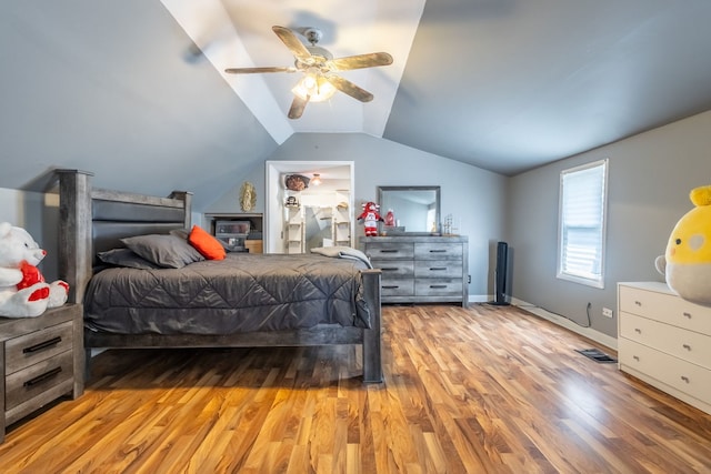 5648 S California Ave, Chicago, IL 60629 - bedroom with wood finished floors, lofted ceiling, ceiling fan, and baseboards