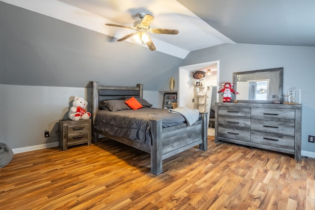 5648 S California Ave, Chicago, IL 60629 - bedroom with lofted ceiling, wood finished floors, baseboards, and a ceiling fan