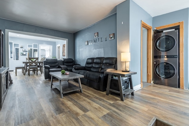 5648 S California Ave, Chicago, IL 60629 - living room featuring stacked washer / dryer and wood finished floors
