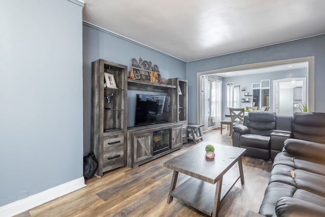 5648 S California Ave, Chicago, IL 60629 - living room with baseboards and wood finished floors
