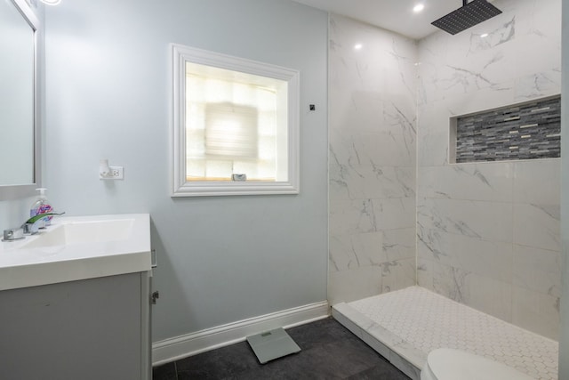 5648 S California Ave, Chicago, IL 60629 - bathroom with a marble finish shower, vanity, baseboards, and toilet