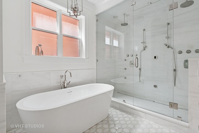 1963 N Dayton St, Chicago, IL 60614 - full bathroom featuring a shower stall, a freestanding bath, tile walls, and tile patterned flooring