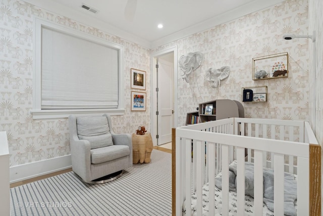 1963 N Dayton St, Chicago, IL 60614 - bedroom with wallpapered walls, a nursery area, and baseboards