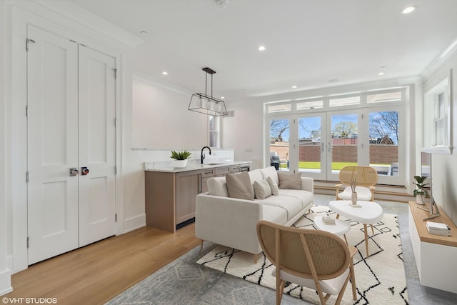 1963 N Dayton St, Chicago, IL 60614 - living room with light wood finished floors, ornamental molding, recessed lighting, and french doors