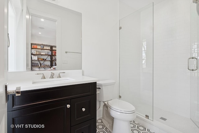 1963 N Dayton St, Chicago, IL 60614 - full bathroom featuring toilet, vanity, a stall shower, and tile patterned floors